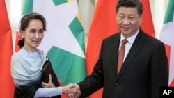 ၂၀၁၉ ဧပြီလတုန်းက နိုင်ငံတော်အတိုင်ပင်ခံ တရုတ်နိုင်ငံခရီးစဉ်အတွင်း သမ္မတ Xi Jinping နှင့်တွေ့ဆုံ