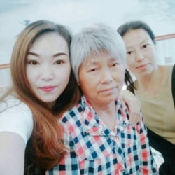 中国湖北郧西访民柯大英及两个女儿(柯大英提供图片)