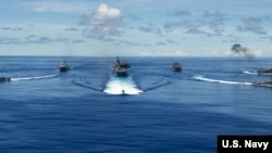 美国海军“里根”号航母打击群9月25日在菲律宾海完成了2020“坚强盾牌”(Valiant Shield 2020)联合演习。