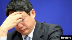 当过中国发改委副主任的刘铁男在北京的记者会上(2009年2月27日)
