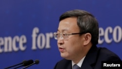 资料照:中国商务部副部长兼国际贸易谈判副代表王受文