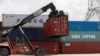 Container của China Shipping and Cosco được chất tại một cảnh ở thành phố Hồ Chí Minh, Việt Nam, ngày 27 tháng 7, 2018.