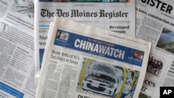 资料照片:《中国日报》在艾奥瓦州《得梅因纪事报》 (The Des Moines Register)上刊登广告,批评特朗普政府的对华贸易政策。(2018年10月19日)