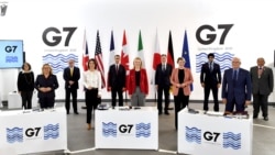七国集团(G7)外长和发展部长在会上合影。(2021年12月12日)