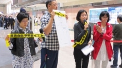 李明哲妻子:持续救援,不会放弃 李明哲妻子:持续救援,不会放弃