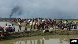 နရေပ်စွန့်ခွာ ထွက်ပြေးလာကြ Rohingya များ (၂၀၀၇)(ဓာတ်ပုံ- AFP)