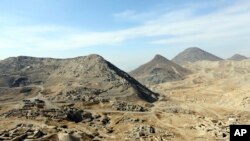 FILE - A general view of Mes Aynak valley, some 40 kilometers (25 miles) southwest of Kabul, Afghanistan, Jan. 18, 2015.