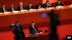 中共总书记习近平在北京人大会堂召开的中共19大开幕式上发表讲话。(2017年10月18日)