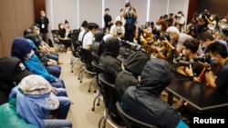 12名被大陆拘留的香港活动人士的家属召开记者会。(2020年9月12日)