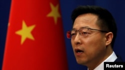 被称为中国“战狼外交”代言人的中国外交部发言人赵立坚在例行记者会上。(资料照片,2020年4月8日)