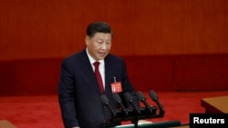 中共领导人习近平在北京人大会堂召开的中共二十大开幕式上讲话。(2022年10月16日)