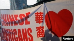 华裔美国人参加集会要求在入学上不歧视亚裔美国人申请者。(2018年10月14日)