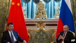 俄罗斯总统普京和中国主席习近平2013年3月在克里姆林宫,习近平掌握大权后首次出访的国家是俄罗斯。