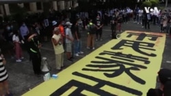 香港多地快闪集会 要求调查15岁少女抗争者死因 香港多地快闪集会 要求调查15岁少女抗争者死因