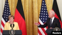 美国总统拜登和德国总理默克尔在白宫东厅共同举行记者会。(2021年7月15日)