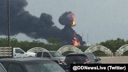 佛罗里达州卡纳维尔角太空探索科技公司(SpaceX)发射场星期四发生爆炸,浓烟升起在发射场上空。(2016年9月1日)