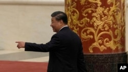 资料照:中共领导人习近平在北京人大会堂出席中共二十大后与媒体见面。(2022年10月23日)
