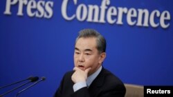 王毅2019年3月8日在北京出席记者会(路透社)
