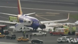 美国西南航空航班引擎失灵 一死七伤 美国西南航空航班引擎失灵 一死七伤