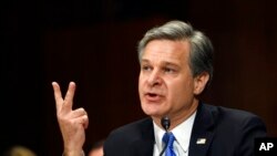 美国联邦调查局(FBI)局长克里斯托弗·雷周二在参议院司法委员会作证(2019年7月23日)。
