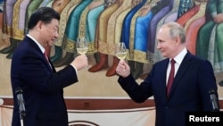 俄罗斯总统普京在克里姆林宫为中国领导人习近平的到访举办招待会。(2023年3月21日)