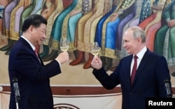 俄罗斯总统普京在克里姆林宫为中国领导人习近平的到访举办招待会。(2023年3月21日)
