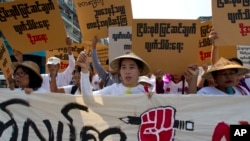 ၂၀၁၈ မတ်လ ၅ ရက်နေ့တုန်းက ရန်ကုန်မြို့တွင် ငြိမ်းစုစီဥပဒေ ပြင်ဆင်ရေးအတွက် ဆန္ဒပြစဉ်