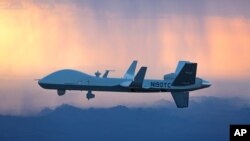 资料照片:通用原子航空系统有限公司的MQ-9B“空中卫士”无人机飞往英国皇家空军位于英国格洛斯特郡费尔福德的基地。(Photo: Business Wire)