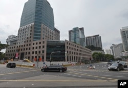 朝鲜领导人金正恩的车队在新加坡果园大道前往瑞吉酒店(2018年6月10日)