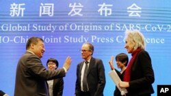 世卫组织结束在中国武汉的新冠病毒朔源调查后召开新闻发布会。(美联社照片)