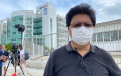 香港记者协会主席杨健兴表示,记者为追求真相,锲而不舍, 前港台外判编导蔡玉玲因查册报道被定罪的案件成为首宗个案, 对新闻工作者来说有很大冲击 (美国之音/汤惠芸)