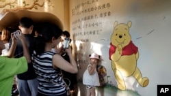 中外文体交流:维尼受阻,西片在华,彭帅挨罚,江苏大赛,上海迪士尼(27图)