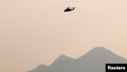 MI-35M မြန်မာစစ်ရဟတ်ယာဉ် ရှမ်းပြည်နယ် မြောက်ပိုင်းဘက်ကို ပျံသန်းခဲ့စဉ်။ (၁၉ ဖေဖဝါရီ ၂၀၁၅)