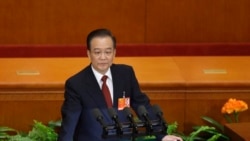时任中国总理的温家宝在全国人大年度会议上讲话。(2013年3月5日)
