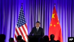 中国国家主席习近平2023年11月15日在旧金山出席美国商界主办的晚宴并发表讲话。(法新社)
