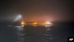 Триває розслідування щодо інциденту в Балтійському морі, де стався розрив електричного кабелю на морському дні. Rajavartiosto via AP