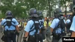 香港星期天(7/14)继续爆发大规模抗议。图片来源:路透社