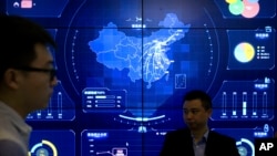 在北京举行的全球移动互联网大会上一幅电子数据显示的中国地图。(2018年7月11日)