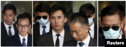 从左至右: 2015年10月19日7名被控殴打抗议者的警察: 警员关嘉豪、警长白荣斌、警员黄伟豪、高级督察刘卓毅、总督察黄祖成、警员陈少丹、警员刘兴沛,离开香港法院