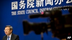 中国商务部副部长王受文2018年6月28日参加新闻发布会,就最新发表的《中国与世界贸易组织》白皮书介绍情况。
