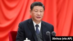 中共党媒新华社发布的中国领导人习近平在北京举行的中纪委会议上讲话的照片。(2022年1月18日)