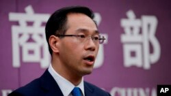 资料照:中国商务部发言人高峰