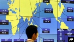 香港证券交易所的全球股市交易的指数图表(资料图片)