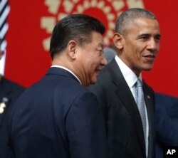 资料照:美国总统奥巴马与中国领导人习近平在秘鲁出席亚太经合组织峰会期间会面。(2016年11月20日)