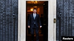 英国外交大臣亨特(路透社2018年11月13日摄)