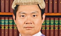 香港高等法院法官李运腾驳回港区国安法首名被告唐英杰,就被控煽动分裂及恐怖活动罪审讯不设陪审团的司法覆核,认为陪审团并非被告宪制权利 (照片来源:香港司法机构)