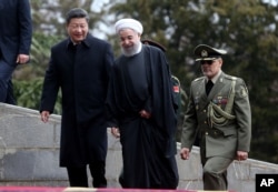 伊朗总统鲁哈尼在德黑兰欢迎中国主席习近平(2016年1月23日)