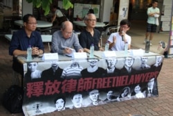 资料照:香港团体在中大举行声援中国维权律师讲座(左起:蔡耀昌、林和立、张耀良、王澄烽)