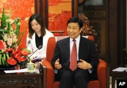 中国副主席李源潮在中南海会见西班牙外长(2013年6月25日)