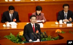 中国最高法院院长周强在人大会议上作报告(2014年3月10日)